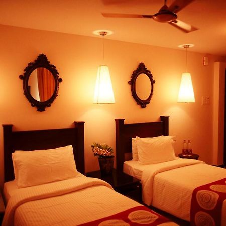 Hotel Highnest Singapperumalkovil Buitenkant foto