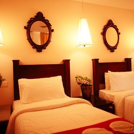 Hotel Highnest Singapperumalkovil Buitenkant foto