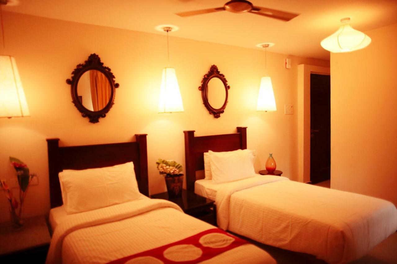 Hotel Highnest Singapperumalkovil Buitenkant foto