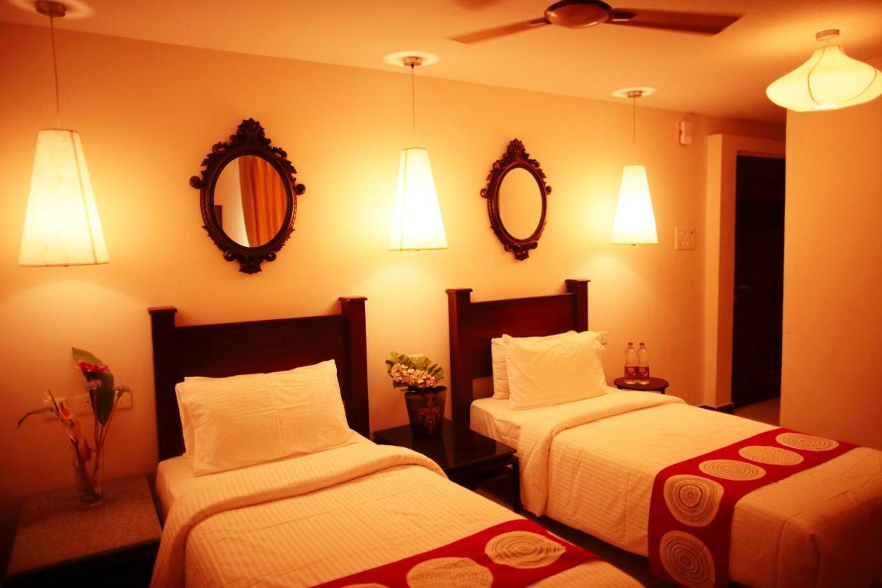 Hotel Highnest Singapperumalkovil Buitenkant foto
